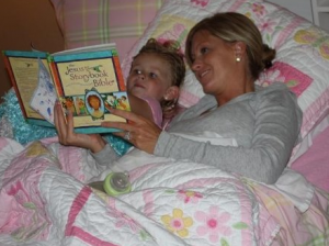 mom and daughter; one glass slipper; reading in bed; jesus storybook bible
