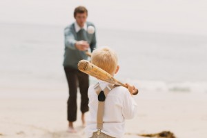 Wallace Family; Beach photos, playing in the sand; suspenders; baseball; father and son